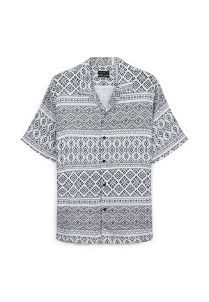 Short-sleeve shirt featuring a black and white geometric pattern with diamonds and lines, crafted from lightweight fabric.