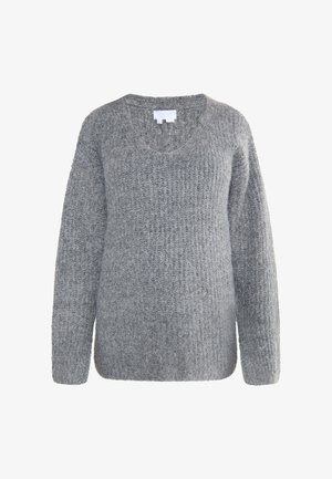 Harmaa neulepaita, jossa on V-päänleikkaus, pitkät hihat ja ribbikuvio. Rentoa kokoa suora helma ja hillityt värivaihtelut.