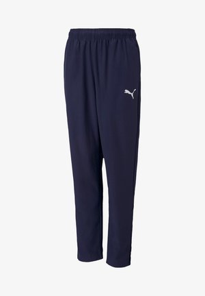 Marineblaue Sporthosen mit einem elastischen Bund, schmal zulaufenden Beinen und einem reflektierenden Puma-Logo auf dem linken Oberschenkel. Leichter Stoff, glatte Textur.