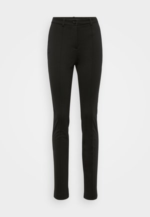Sorte skreddersydde bukser med slim fit. Har en glatt tekstur, frontpreging og en enkel knappelukking i livet.