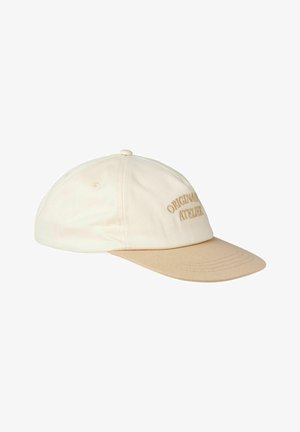 Casquette de baseball en coton beige avec une visière incurvée, arborant le texte brodé « ORIGINAL ATELIER » à l'avant et un bouton en tissu assorti sur le dessus.