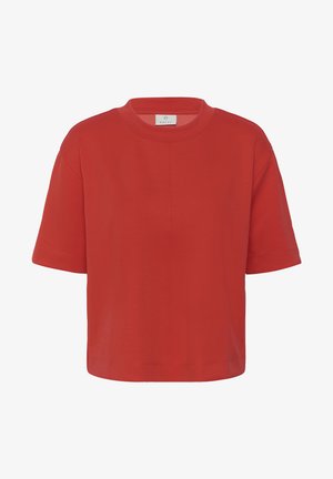 Rood T-shirt met korte mouwen en een ronde hals, losse pasvorm en een klein merklabel aan de binnenkant van de kraag.