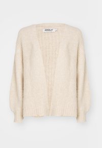 Cream-colored cardigan with a ribbed texture, open front, and long drooping sleeves. Made from soft, textured fabric. Minimalist design.