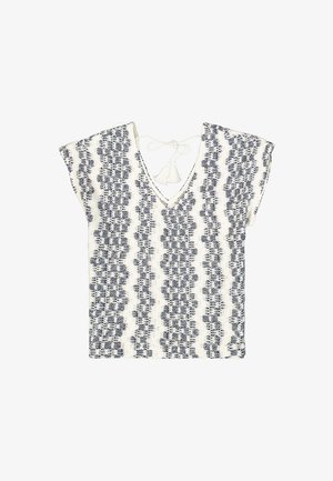 Witte top met een marineblauw golfpatroon, korte mouwen, V-hals en striksluiting met kwastjes aan de achterkant. Geverfd textiel.