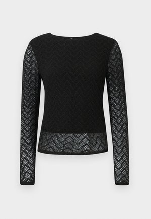 Maglietta nera a maniche lunghe in pizzo con motivo a zigzag. Caratterizzata da un collo rotondo e un design trasparente sulle maniche e sull'orlo.
