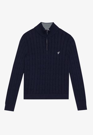 Marineblauer Kabelstrick-Pullover mit einem Halbreißverschluss-Kragen, gerippten Bündchen und Saum. Mit einem dezenten Logo auf der Brust, aus strukturiertem Strickstoff gefertigt.