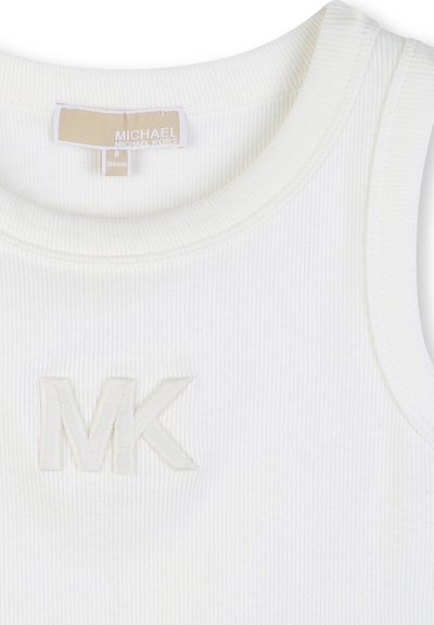 Haut sans manches blanc à côtes avec logo brodé "MK" et étiquette beige Michael Kors, taille 8 (126 cm).