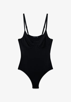 Costume intero nero con sottili spalline regolabili e coppe con sottoseno, etichettato come taglia piccola.