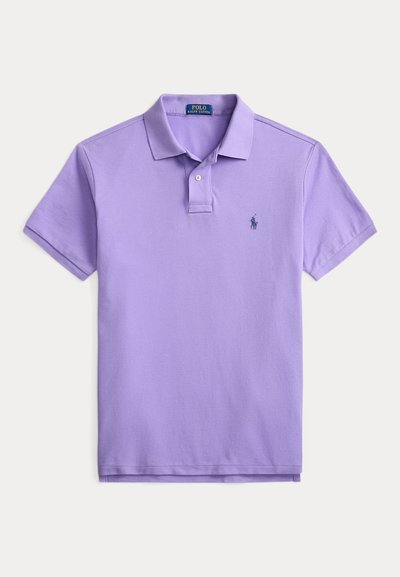 Lavender short-sleeve polo shirt with collar, two-button placket, and small dark blue embroidered horse logo on the left chest.