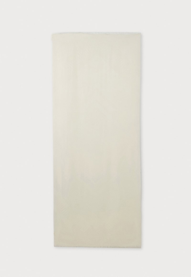 Morceau de tissu rectangulaire uni écru posé à plat sur un fond blanc.