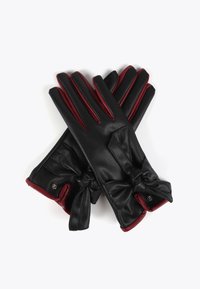 Czarne skórzane rękawiczki z czerwonymi akcentami, z detalem w postaci kokardy na nadgarstku i gładką teksturą. Design z pięcioma palcami z eleganckim przeszyciem.
