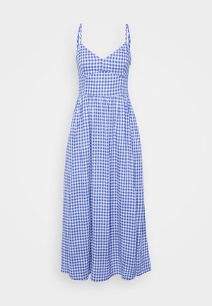Blue and white gingham-patterned sundress with a fitted bodice, thin shoulder straps, and a flowy, knee-length skirt. Cotton material.
