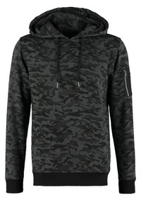 Hettegenser i svart og grå camouflagemønster, laget av myk stoff, med en frontlomme og en lomme på ermet med glidelås.