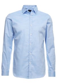 Ljusblå skjorta med långt ärm tillverkad av vävt tyg, med spetsig krage, knappstängning framtill och knappade manschetter. Slät struktur och skräddarsydd passform.