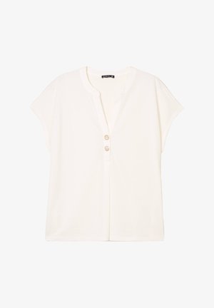 Ivory short-sleeve top, relaxed fit, featuring a V-neckline and two wooden buttons at the front. Soft fabric with smooth texture.