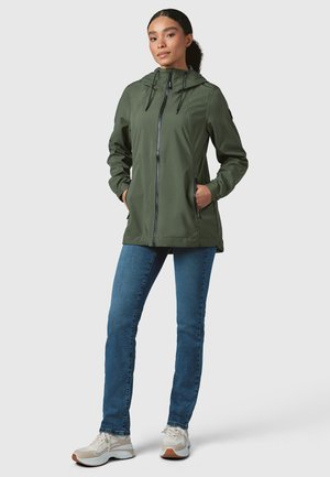 Green waterproof jacket with a hood, two side pockets, zipper closure, and a relaxed fit. Paired with blue jeans and light sneakers.