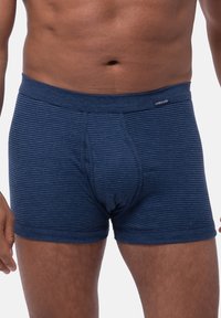Marinblå randiga kalsonger gjorda av mjukt tyg, med en åtsittande design och elastisk midja med en liten logodetalj.