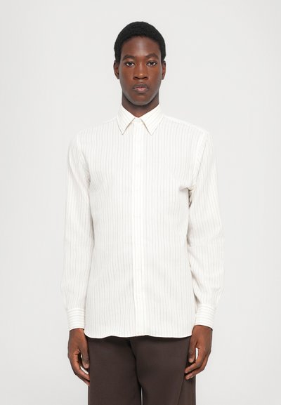 White shirt with vertical stripes in light brown, button-up design, long sleeves, and a pointed collar. Smooth fabric with tailored fit.