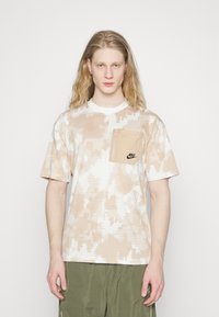 Nike Sportswear Triko s potiskem - beige/black