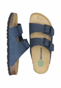 Dark blue sandals with two adjustable straps, cork insoles, and a textured rubber sole. Features a spiral logo on the insole.