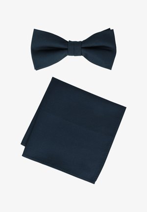 Navy blue bow tie and matching pocket square, both made of smooth fabric, displayed on a white background.