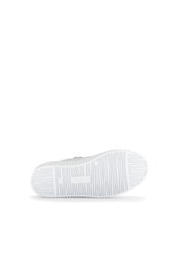 White rubber shoe sole with textured grip patterns and ridged edges. Logo "Gabor" embossed on the surface.