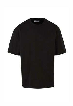 Czarny bawełniany t-shirt z okrągłym dekoltem, krótkimi rękawami i luźnym krojem. Gładka tekstura i minimalistyczny design. Metka przy dekolcie.