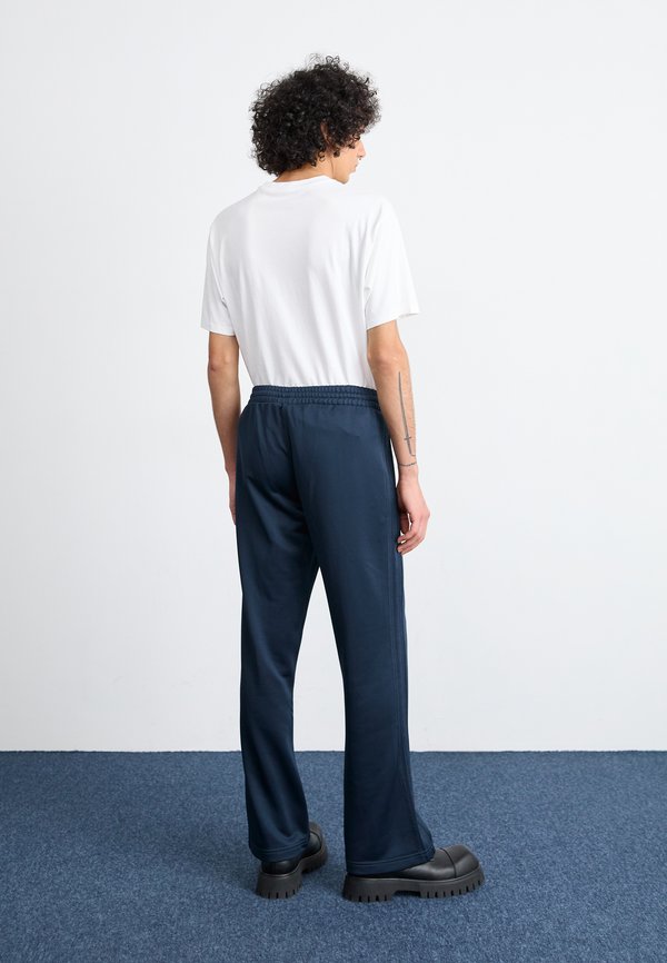 FLARE - Tracksuit bottoms - aurora ink2