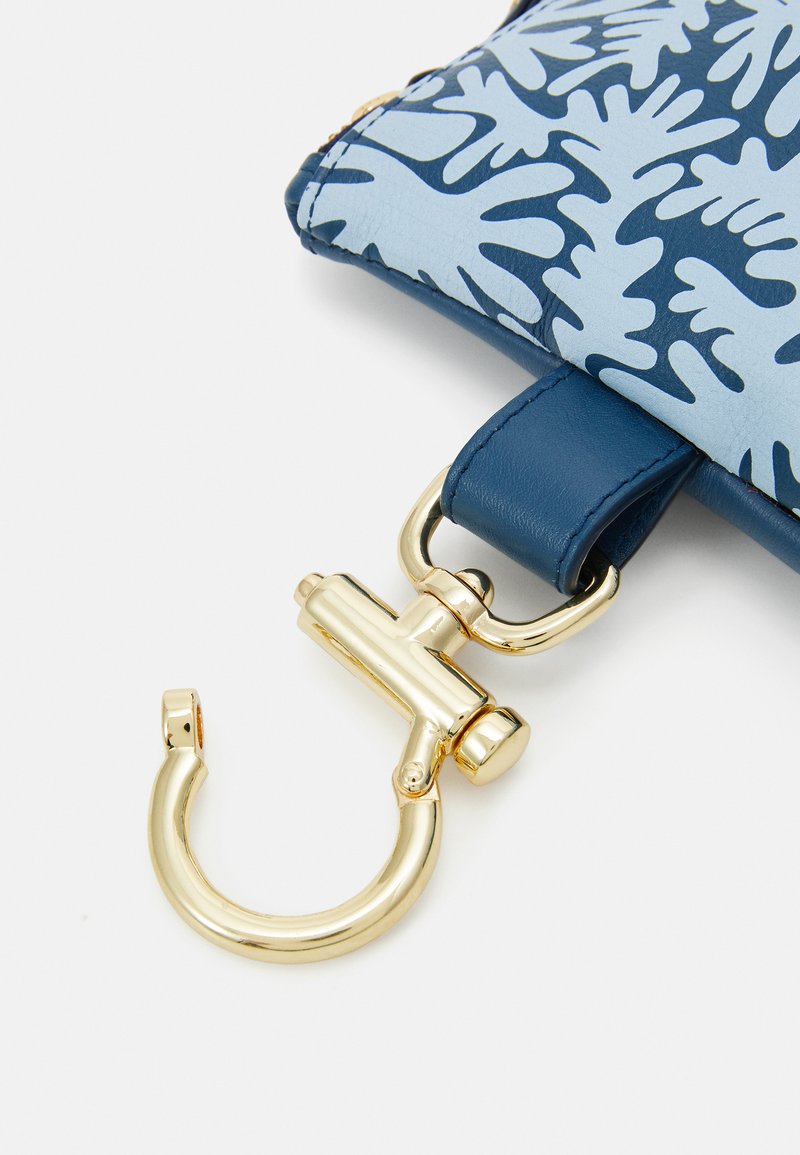 Blue leather bag featuring a coral pattern, with a gold metal hook and a stiffer blue leather strap for attachment or carrying.