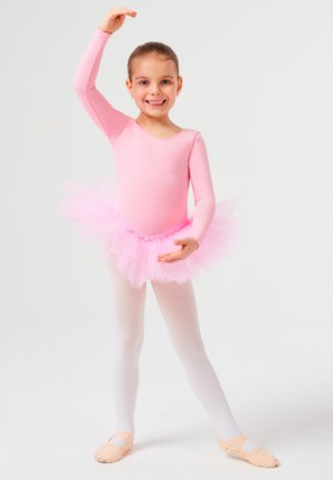 Pink long-sleeve leotard with a fluffy pink tulle skirt, white leggings, and light pink ballet shoes; girl poses with a raised hand.