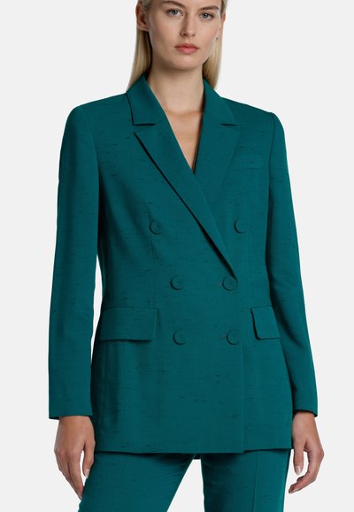 Teal double-breasted blazer with notched lapels, two front pockets, and textured fabric. Tailored fit with button accents.
