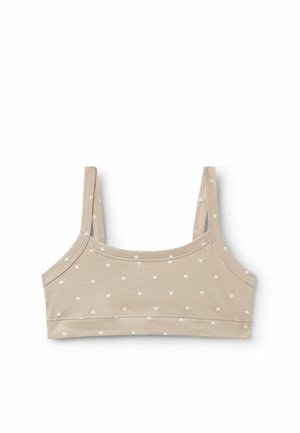 Crop top beige in cotone con sottili spalline e piccoli motivi a forma di cuore bianchi distribuiti uniformemente sul tessuto su sfondo bianco.