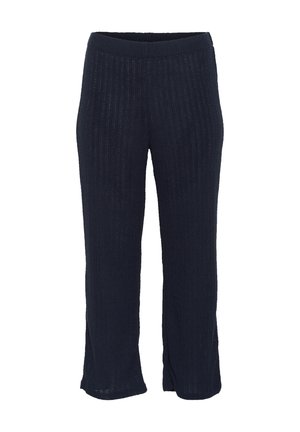 Navy ribbed knit pants with a wide waistband, featuring a relaxed fit and side slits at the hem for ease of movement.