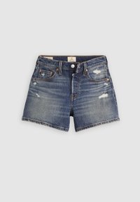 Μπλε τζιν σορτς με φθαρμένες λεπτομέρειες, μπροστινό κούμπωμα με κουμπιά και φερμουάρ, θηλιές για ζώνη και σχεδιασμό με πέντε τσέπες.
