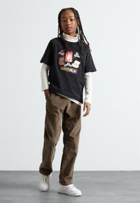 Nike Sportswear TEE BOXY GOT EM UNISEX - Tricou cu imprimeu - black