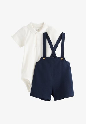 Hvid babybodystocking med korte ærmer og krave, kombineret med marineblå seleshorts med knaplukning på stropperne.