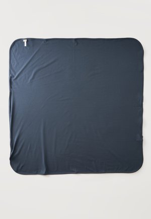 Dark blue soft rectangular blanket with rounded corners laid flat on a white surface.