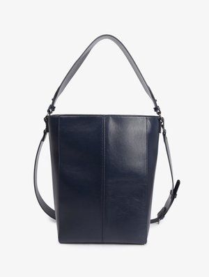 Dark blue leather shoulder bag with adjustable strap and minimalist design, smooth texture, and subtle stitching details.
