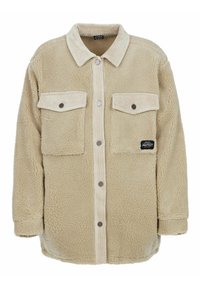 Veste en polaire beige oversize avec un col en velours côtelé, dotée de deux poches avant, de boutons-pression et d'un logo de la marque sur le côté gauche.
