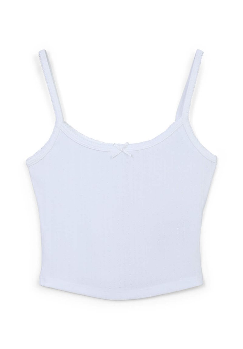 Camisola bianca in cotone con spalline sottili regolabili, scollatura quadrata e un dettaglio a fiocco decorativo al centro frontale. Tessuto liscio.