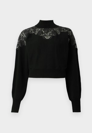 Maglione nero corto con collo alto, caratterizzato da dettagli in pizzo sulle spalle e maniche lunghe. Tessuto in maglia morbido.