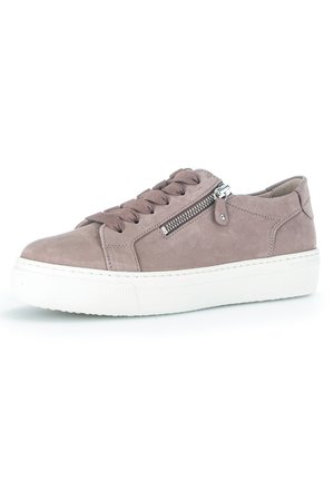 Suede sneaker in light taupe with a white rubber sole, featuring a side zipper and flat laces. Rounded toe and minimal stitching details.