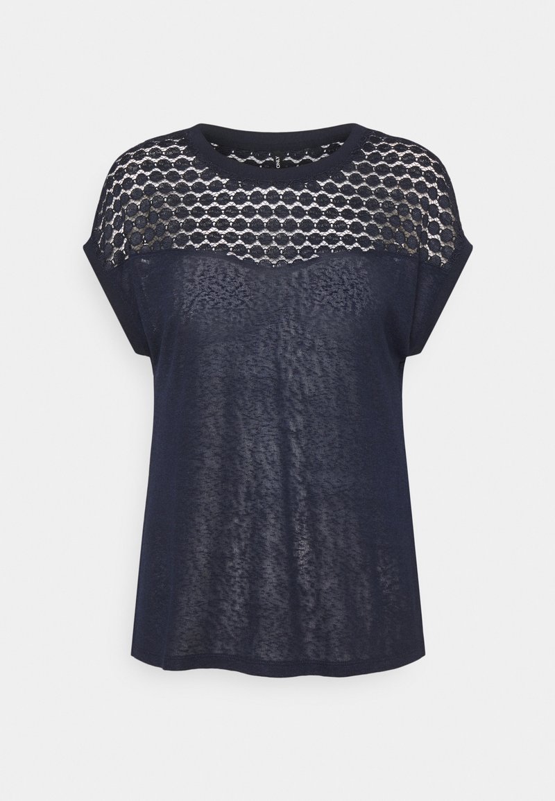 T-shirt bleu marine avec un panneau en dentelle transparente aux épaules, un col rond, des manches courtes et une coupe décontractée avec une texture douce.