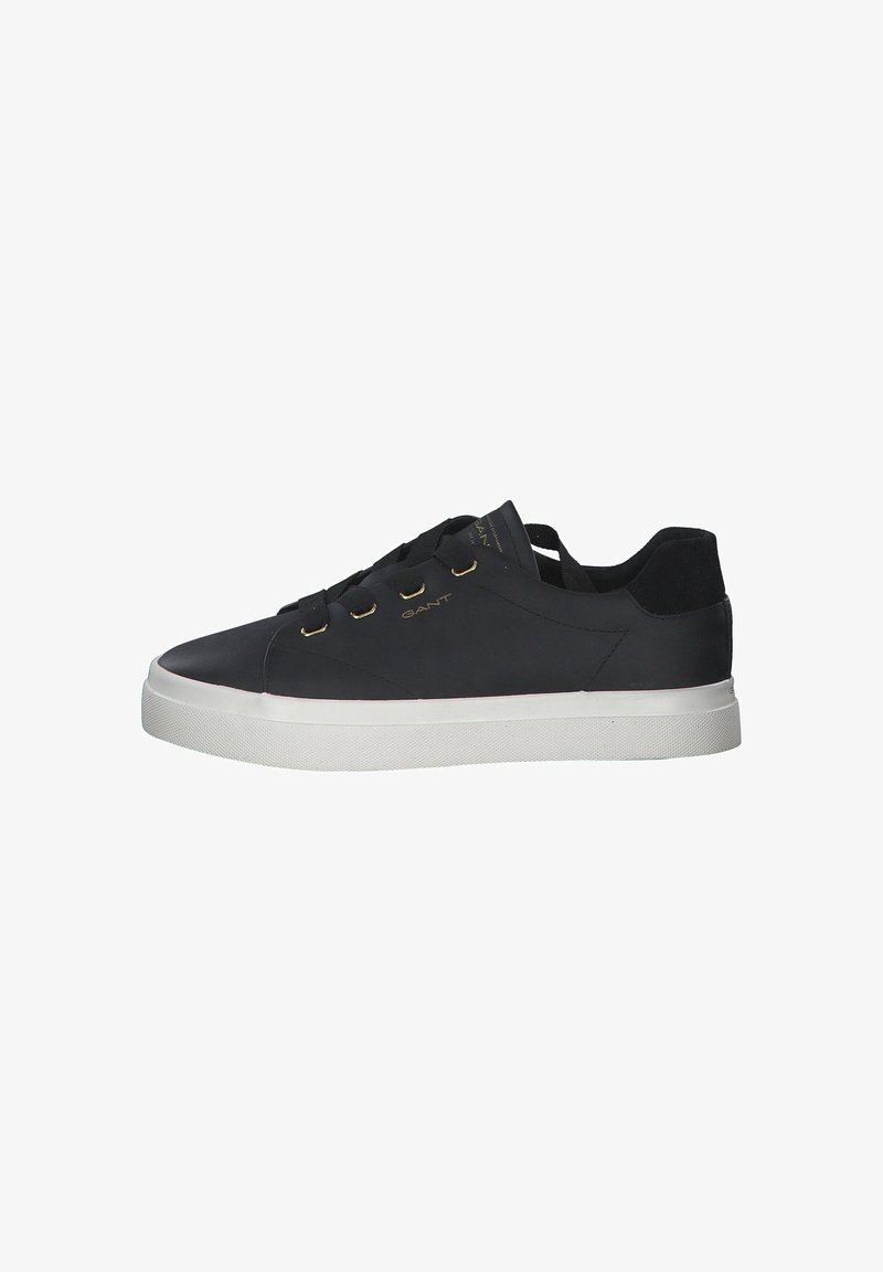 Black leather sneakers with a smooth finish, white rubber sole, and gold-tone metal eyelets. Features flat black laces and minimal branding.