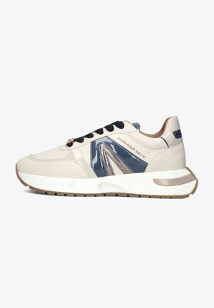 Beige and navy sneaker with patent leather accents, mesh tongue, round laces, and textured sole. Features brand name on the side.
