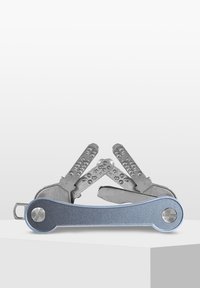 Multi-tool with a blue aluminum handle and silver metal tools, featuring multiple screwdrivers and functional attachments. Smooth finish.