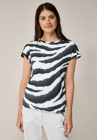 Schwarz-weißer gestreifter T-Shirt mit Rundhalsausschnitt, kurzen �Ärmeln und verstellbarem Kordelzug am Saum. Weiches Baumwollmaterial.