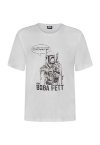 T-shirt en coton blanc avec un graphique noir de Boba Fett tenant des armes, avec une bulle de dialogue disant "TU NE VAUX RIEN MORT." Texte en dessous : "BOBA FETT."
