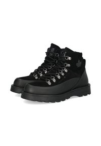 Scarpe da trekking nere con un design in pelle scamosciata e gomma, supporto per caviglia alta, occhielli in metallo e una suola testurizzata per una migliore aderenza.
