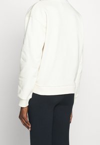 Claudie Pierlot Mikina - off-white